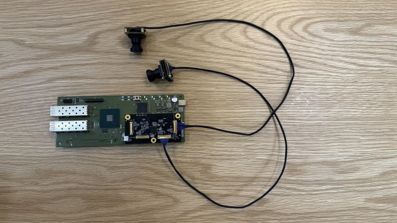 Two ZED X One Core cameras connected to the ZED Link MIPI Quad mounted on the Holoscan Sensor Bridge
