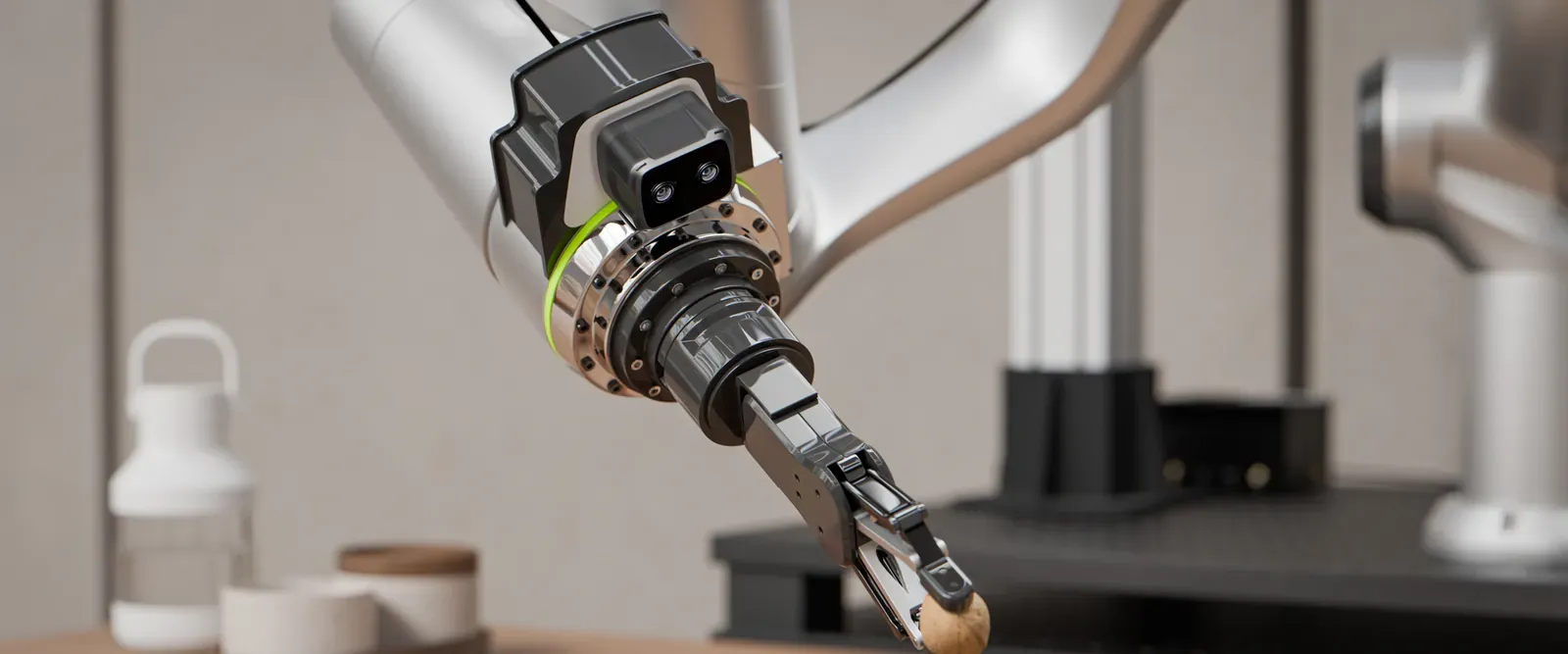 Robotic arm with a ZED X Nano on the wrist, picking up an object